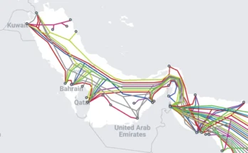 Multi-colored lines running through a map representing the Strait of Hormuz show undersea Internet cable routes.