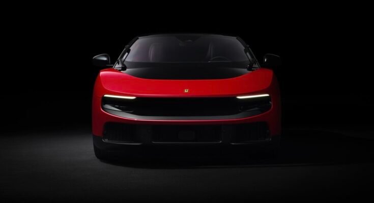 A red Ferrari Luce, head-on
