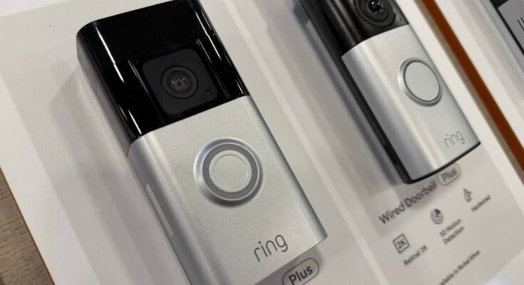 Ring devices that include a doorbell and camera on display inside a store.