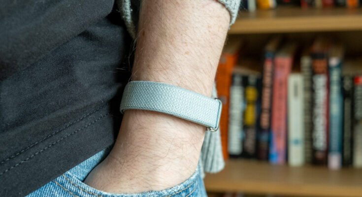 Fitbit Air hand in pocket