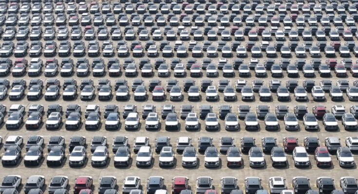 A large number of new cars are parked in a car production base awaiting transfer in Hangzhou, Zhejiang Province, China, on May 27, 2026. (Photo by Costfoto/NurPhoto via Getty Images)