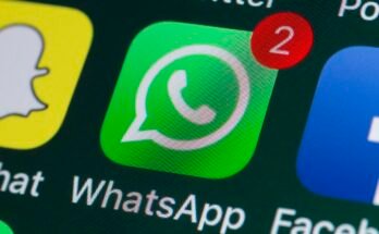 App icons for WhatsApp, Facebook, and Snapchat on an iPhone screen