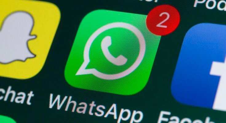 App icons for WhatsApp, Facebook, and Snapchat on an iPhone screen
