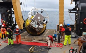 NOAA crew retrieving buoy