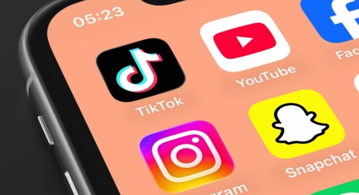 A phone screen displays app icons for TikTok, YouTube, Facebook, Instagram, and Snapchat.