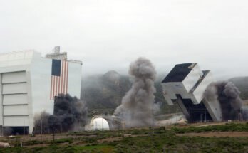 Facilities for launching rockets and space shuttles are seen being toppled after controlled detonations