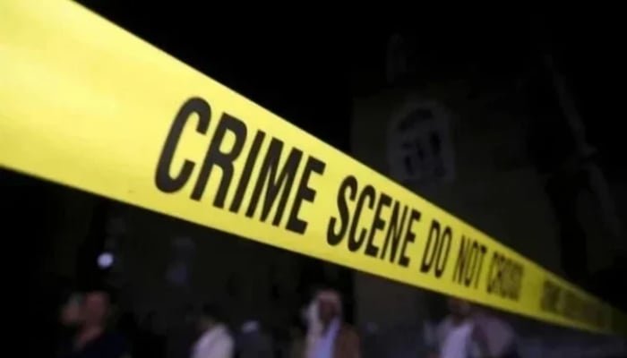 پولیس ٹیپ کے ساتھ محدود کرائم سین کی نمائندہ تصویر۔ - رائٹرز/فائل